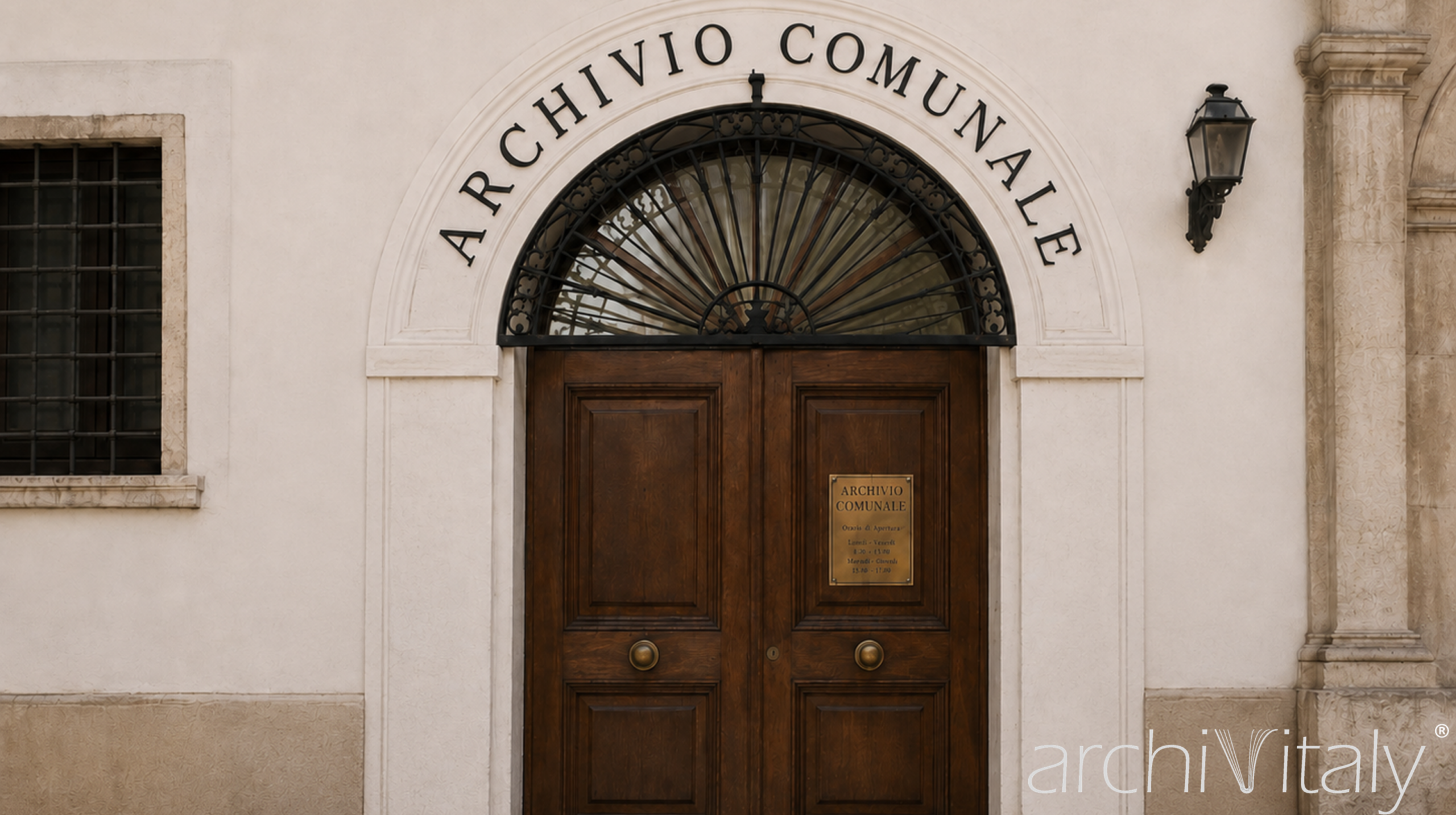 Entrance to one of the municipal archives in Italy, with the words “Archivio Comunale” above the wooden doorway.