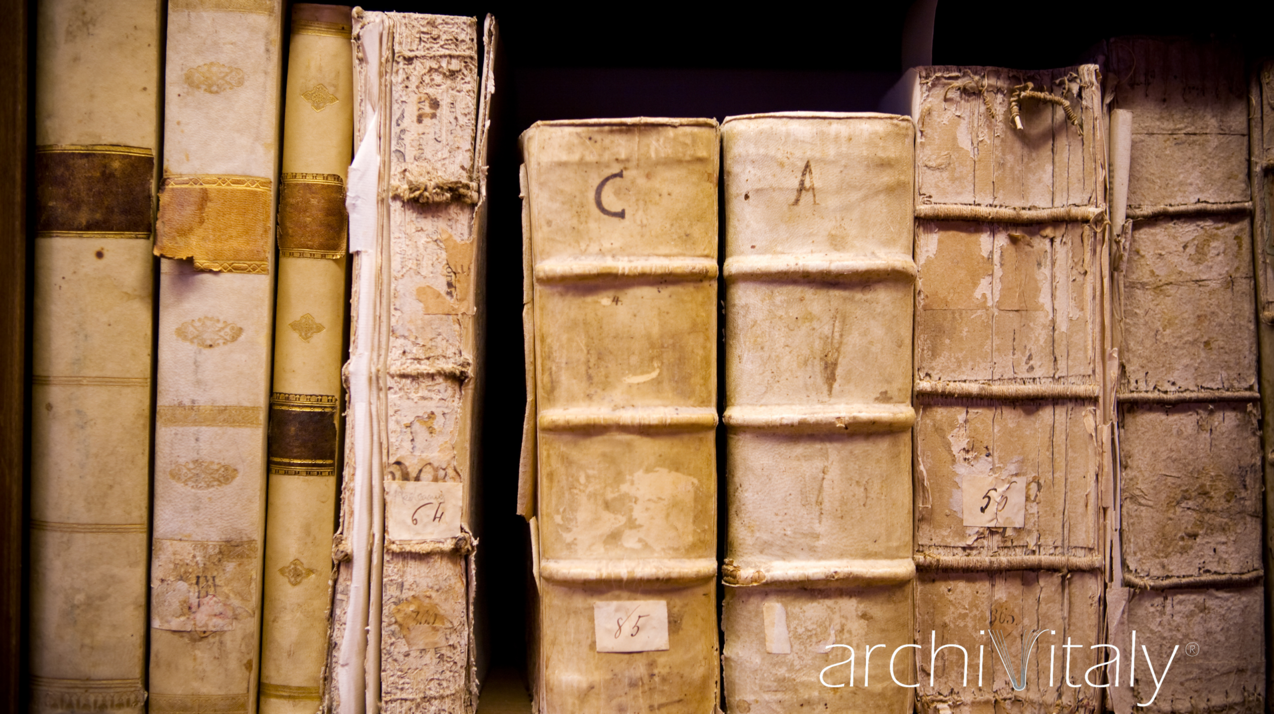 Historic ecclesiastical archive volumes used for an article on digitised ecclesiastical archives in Italy